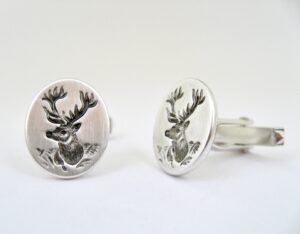 Manschettenknöpfe aus Silber mit Hirsch